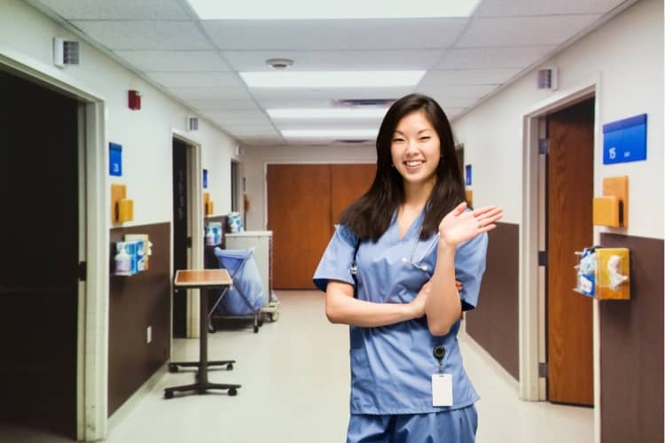 A nurse is waving hand.
